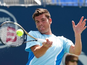 Canada's Frank Dancevic earned a first-round upset win over Croatia's Ivo Karlovic on Tuesday. (Christinne Muschi/Reuters/Files)