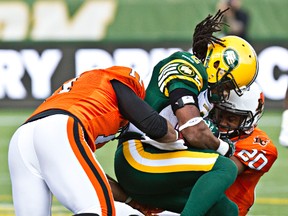 Fred Stamps, shown here getting tackled in the pre-season game against the B.C. Lions, says he's always healthy. (Codie McLachlan, Edmonton Sun)