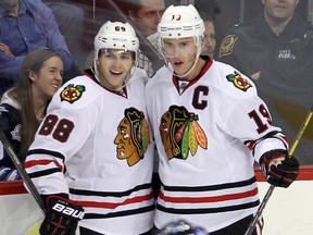 Blackhawks right wing Patrick Kane (left) and centre Jonathan Toews want to stick together in Chicago. (Brian Donogh/QMI Agency/Files)