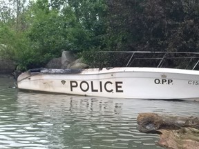 An OPP patrol boat was torched in Port Stanley, Ont., harbour. (OPP Handout Photo)