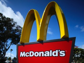 A McDonald's restaurant sign is seen at a McDonald's restaurant in Del Mar, Calif., in this April 16, 2013 file photo. (REUTERS/Mike Blake/Files)