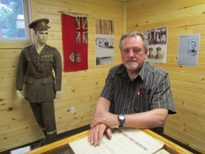 Don Poland, president of the Plympton-Wyoming Historical Society, stands in one of the rooms of the society''s new museum in Camlachie. It officially opened recently in the lower level of the Camlachie Cultural Library Museum. PAUL MORDEN/THE OBSERVER/QMI AGENCY