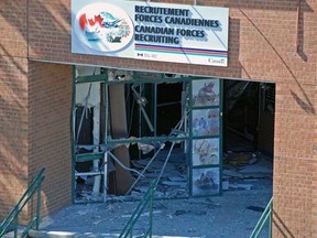 Scene after an explosion at a Canadian Forces recruiting centre in Trois-Rivieres, Que., July 2, 2010. (Stephane Desrochers/QMI Agency)