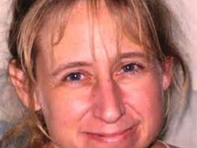 Laura Simonson, 37, is pictured in this handout photo provided by the Farmington Police Department, June 25, 2014. Steven Zelich, 52, was taken into custody on Wednesday in connection with the deaths of two women whose bodies were found in separate suitcases along a rural road earlier this month, authorities said. One of the victims was identified as Laura Simonson, 37, of Farmington, Minnesota, who was reported missing in November. REUTERS/Farmington Police Department/Handout via Reuters