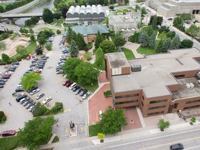 This property, owned by Middlesex County, on which the Middlesex-London Health Unit currently stands, could be the site of an office tower or some other development if a zoning change is approved. The site is pictured from the rooftop of an adjacent apartment building on King St. and is considered prime property. (CRAIG GLOVER/The London Free Press)
