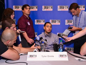 Tyler Ennis speaks to reporters during media availability as part of the  NBA draft in New York yesterday. If Ennis is still available when the Raptors pick at 20, some think they will grab him.(AFP)
