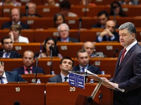Ukraine's President Petro Poroshenko addresses the Parliamentary Assembly of the Council of Europe in Strasbourg, June 26, 2014. (REUTERS/Vincent Kessler)