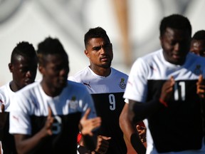 Ghana's Kevin-Prince Boateng (9) attends a training session with teammate Sulley Muntari (11) ahead of their 2014 World Cup match against Portugal, in Brasilia in this June 25, 2014 file photo. REUTERS/Ueslei Marcelino