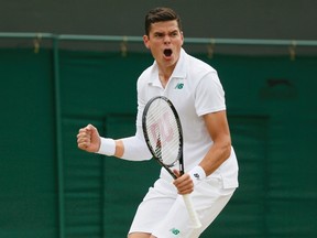 Milos Raonic of Canada reacts as he breaks the service of Jack Sock of the U.S. during their men's singles tennis match at the Wimbledon Tennis Championships, in London June 26, 2014. (REUTERS/Stefan Wermuth)