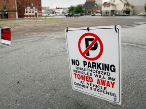 These no parking and private property signs were put up across both entrances at the former Hotel Quinte lot in downtown Belleville, Ont. a few weeks ago. - JEROME LESSARD/THE INTELLIGENCER