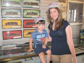 Four-year-old Talan Jefferies, seen here with Chatham Railroad Museum coordinator Erika Broadbent, enjoyed his first-ever visit to the facility on June 26.