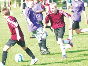 Action from the Portage Youth Soccer Association U12 final where Portage (Bowden) defeated MacGregor 2 3-2. (Kevin Hirschfield/The Graphic)