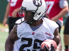 Ottawa RedBlacks RB Chevon Walker runs the ball during practice on June 26, 2014. Errol McGihon/Ottawa Sun/QMI Agency