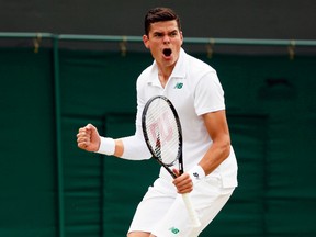 Milos Raonic reacts after he breaks Jack Sock during their men's singles match at Wimbledon, in London, June 26, 2014. (STEFAN WERMUTH/Reuters)