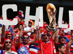 Chilean fans were warmly welcomed by host Brazilians but that has cooled since it turned out the two teams will meet in the second round of the World Cup. (Reuters)