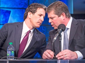 Maple Leafs GM Dave Nonis (right) says a big trade or signing is not a certainty. The ‘X’ factor, though, could be the role played by new team president Brendan Shanahan (left). (Reuters)