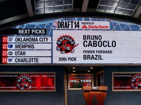 A video screen shows the selection of Bruno Caboclo as the 20th overall pick by the Raptors last night in Brooklyn. (AFP)