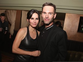 Courteney Cox and Johnny McDaid attends the "Just Before I Go" Premiere after party during the 2014 Tribeca Film Festival sponsored by Bombay Sapphire at The Flatiron Room on April 24, 2014 in New York City.  Rob Kim/Getty Images for the 2014 Tribeca Film Festival/AFP