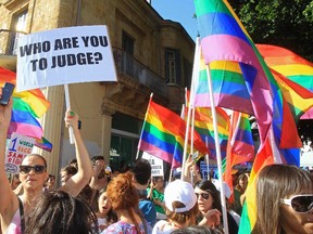 People marching for gay rights. 

REUTERS/Andreas Manolis