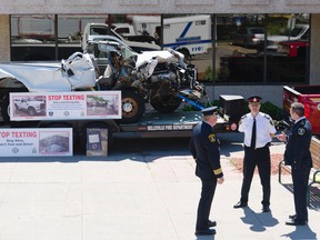 Belleville Deputy Fire Chief Ray Ellis, Deputy Chief of the Belleville Police department Paul VandeGraaf and Deputy Chief of Operations, Carl Bowker got together outside Loyalist College to launch the Stop Texting and Distracted driving campaign on Friday.

Lacy Gillott/TheIntelligencer