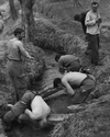 Soldiers of 2 PPCLI washing up in a stream, summer 1951. (SUPPLIED)
