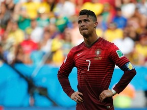Portugal's Cristiano Ronaldo reacts after their 2014 World Cup Group G soccer match against Ghana at the Brasilia national stadium in Brasilia June 26, 2014. (REUTERS/Jorge Silva)