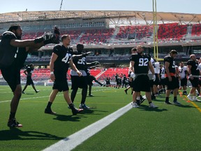 Ottawa RedBlacks players practise for the first time Friday at their new home in Lansdowne Park. (Tony Caldwell/Ottawa Sun)