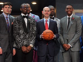 NBA commissioner Adam Silver (second from right) poses with draft prospects from left Doug McDermott , Andrew Wiggins and Jabari Parker before the 2014 NBA Draft at the Barclays Center. (Brad Penner-USA TODAY Sports)
