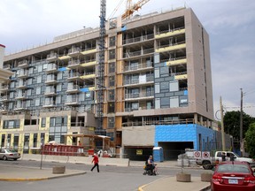 Work on the Anna Lane condominium project at the corner of Queen and Bagot streets has ceased after liens were issued against the company hired to manage the project's construction. (Ian MacAlpine/The Whig-Standard)