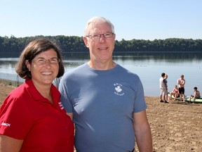 Vicki Keith and her husband John Munro are just two of the many marathon swimmers author Laura E. Young interviewed for her book, Solo, Yet Never Alone: Swimming the Great Lakes. Keith and Munro are seen at Grass Creek Park before Keith and her Y Penguins students go for a training swim on Friday. (Julia McKay/The Whig-Standard)