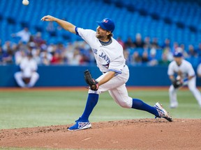 R.A, Dickey throws during the third inning against the Chicago White Sox on Friday night at the Rogers Centre. (Ernest Doroszuk/Toronto Sun)