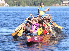 Gino Donato/The Sudbury Star
In this file photo, members of the CRA Crazy Paddlers' dragon boat team practise on Lake Ramsey. For more information go to www.sudburydragonboats.com.