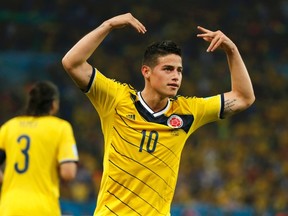 Colombia's James Rodriguez celebrates after scoring his second goal during the 2014 World Cup round of 16 game between Colombia and Uruguay at the Maracana stadium in Rio de Janeiro June 28, 2014. (REUTERS/Sergio Moraes)