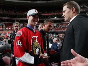 Miles Gendron meets with European scout Mikko Ruutu Saturday after being drafted #70 by the Ottawa Senators on Day Two of the 2014 NHL Draft at the Wells Fargo Center on June 28, 2014 in Philadelphia, Pennsylvania.  
Bruce Bennett/Getty Images/AFP