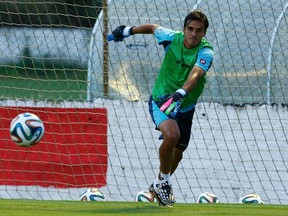 Costa Rica's national soccer team player Bryan Ruiz plays as a goalkeeper during a training session in Recife June 28, 2014. (REUTERS/Ruben Sprich)