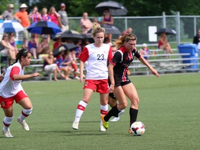 Ottawa Fury FC's Arin Gilliland protects the ball during the W-League squad's 4-0 blanking of the London Gryphons at Algonquin College Saturday,June 28, 2014. Gilliland scored threes times in the win. 
(Chris Hofley/Ottawa Sun)