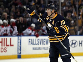 Buffalo Sabres defenseman Christian Ehrhoff (10) celebrates his goal during the second period against the Carolina Hurricanes at First Niagara Center. Mandatory Credit: Timothy T. Ludwig-USA TODAY Sports