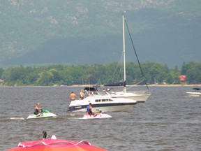 People were out jetskiing Sunday, June 29, 2014 at Constance Bay, near the area where a 26-year-old man was seriously injured Saturday, June 29, 2014 after he crashed his jetski into an anchored boat.
Danielle Bell/Ottawa Sun/QMI AGENCY