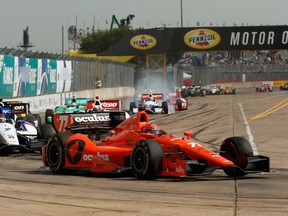 Simon Pagenaud of France, driver of the #77 Schmidt Peterson Hamilton Motorsports Dallara Honda, leads a group of cars during the Verizon IndyCar Series Shell and Pennzoil Grand Prix of Houston Race No. 2 on Sunday. (AFP)