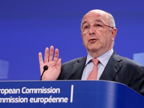 European Union competition commissioner Joaquin Almunia addresses a news conference at the EU Commission headquarters in Brussels June 11, 2014. REUTERS/Francois Lenoir