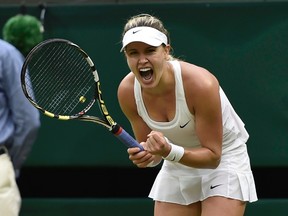 Eugenie Bouchard of Canada reacts after defeating Alize Cornet of France in their women's singles tennis match at the Wimbledon Tennis Championships, in London June 30, 2014.              REUTERS/Toby Melville