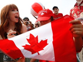 Singer Carly Rae Jepsen signs autographs during Canada Day celebrations on Parliament Hill in Ottawa in this July 1, 2013 file photo. (REUTERS/Chris Wattie)