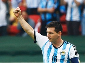 Argentina's Lionel Messi celebrates his second goal during the 2014 World Cup Group F soccer match against Nigeria at the Beira Rio stadium in Porto Alegre June 25, 2014 (REUTERS/Stefano Rellandini)