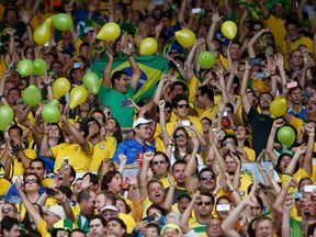 Brazil fans cheer before the 2014 World Cup round of 16 game between Brazil and Chile at the Mineirao stadium in Belo Horizonte June 28, 2014. (REUTERS/Toru Hanai)