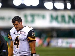 Tiger-Cats quarterback Zach Collaros walks off the field after Hamilton's loss to the Saskatchewan Roughriders in Regina on the weekend. (REUTERS)