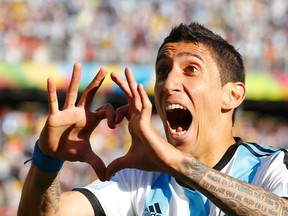 Argentina's Angel Di Maria celebrates scoring against Switzerland during extra time in their 2014 World Cup round of 16 game at the Corinthians arena in Sao Paulo July 1, 2014. (REUTERS/Ivan Alvarado)