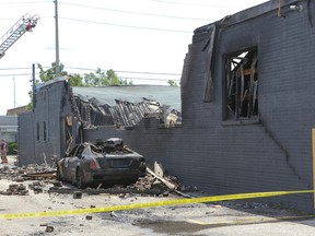 Eighty firefighters were called out to the factory blaze on Six Point Rd. in Etobicoke. (DAVE THOMAS/Toronto Sun)