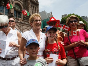 Premier Kathleen Wynne is pictured at Canada Day celebrations held at Queen's Park. (STAN BEHAL, Toronto Sun)