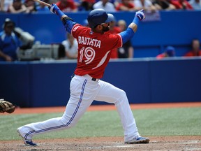 Blue Jays designated hitter Jose Bautista bats against the Milwaukee Brewers at Rogers Centre on July 1, 2014. (PETER LLEWELLYN/USA TODAY Sports)