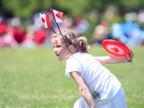 Gino Donato/The Sudbury Star
Seven-year-old Mikayla Rintala, of Lively, plays frisbee with her grandfather at Science North during the Canada Day celebrations on Tuesday afternoon.
